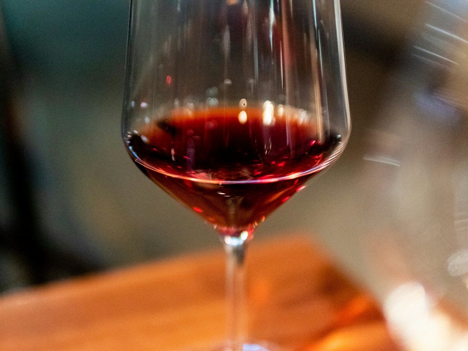 clear wine glass with red wine